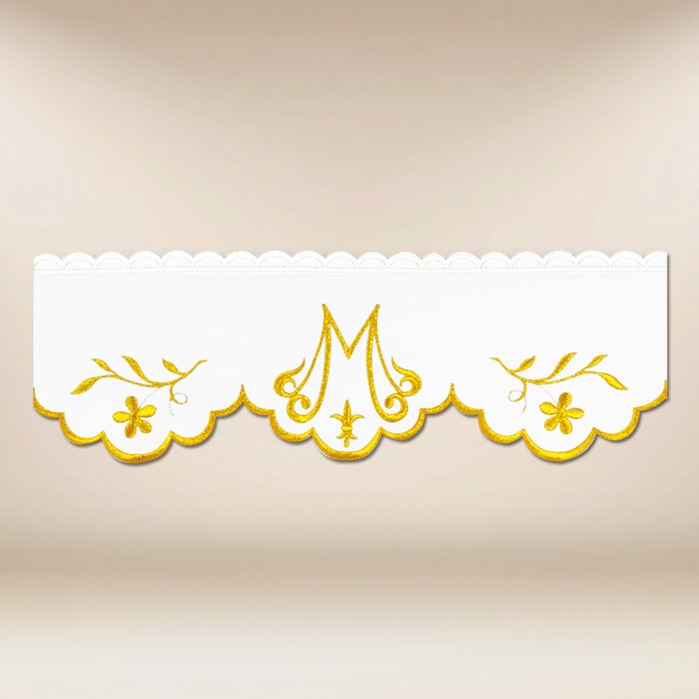 Pizzo ricamato con delicato ricamo dorato