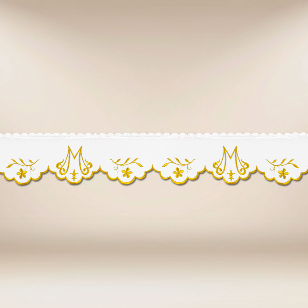 Pizzo ricamato con delicato ricamo dorato