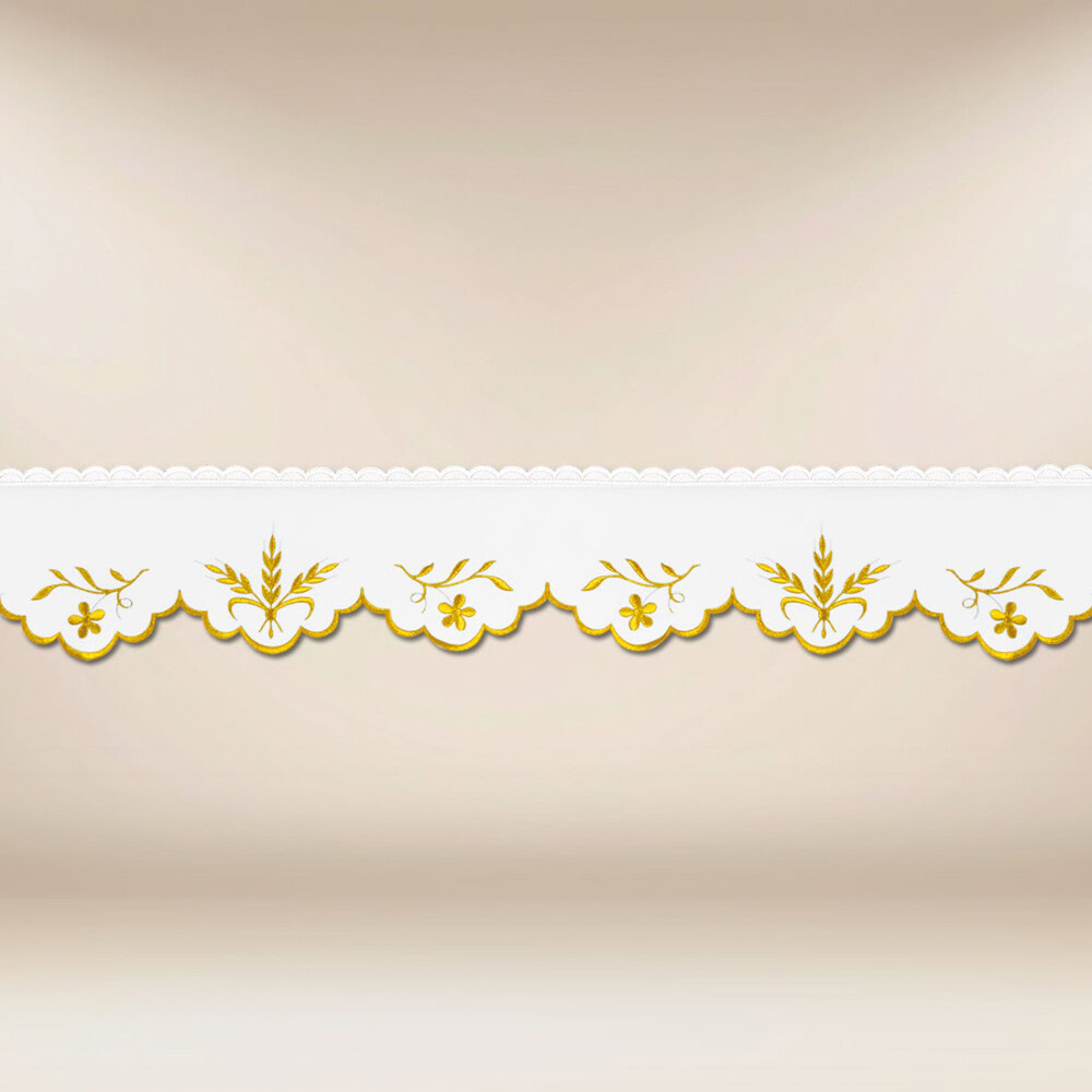 Pizzo ricamato con delicato ricamo dorato