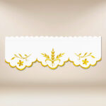 Pizzo ricamato con delicato ricamo dorato